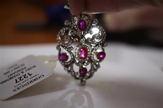 An attractive early 20th century gold and platinum, ruby and diamond pendant brooch, overall 2.5in.